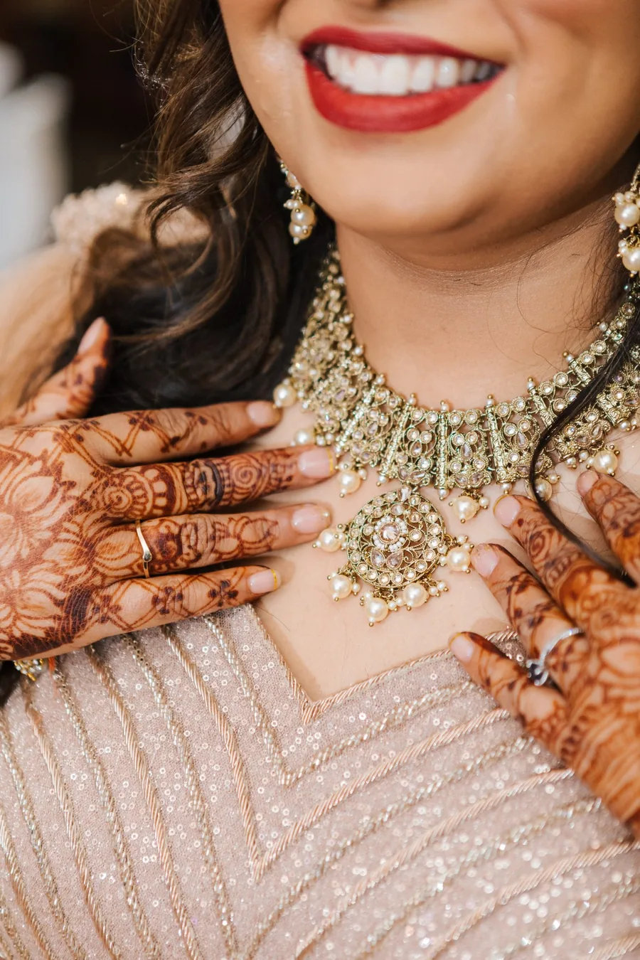 South Asian bride with mehndi henna hands and gold jewellery — multicultural wedding photography Southern Ontario by Captivate Photo+Cinema